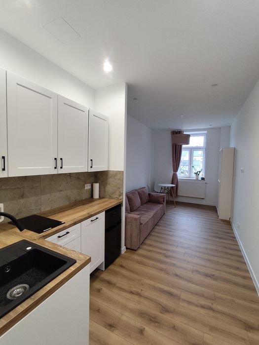 Apartament 2 pokoje, stare miasto, ogrzewanie i ciepła woda miejska.