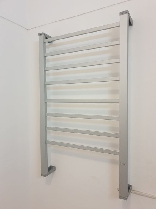 Aquecedor de parede para toalhas.