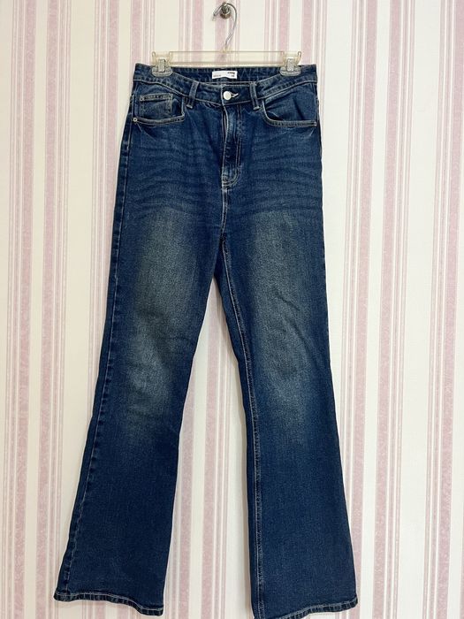 Жіночі джинси кльош