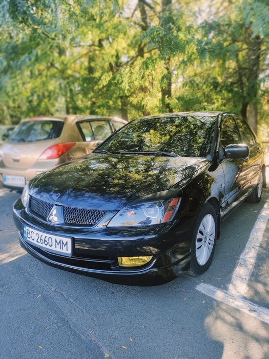 Ланцер 9  1.6 4700$