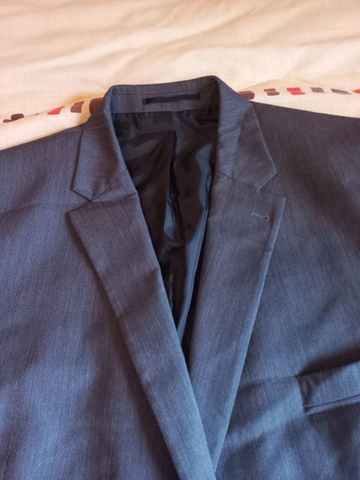 Casaco cinza  da parte do blazer