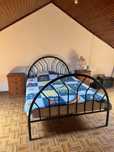Cama e mesas de cabeceira