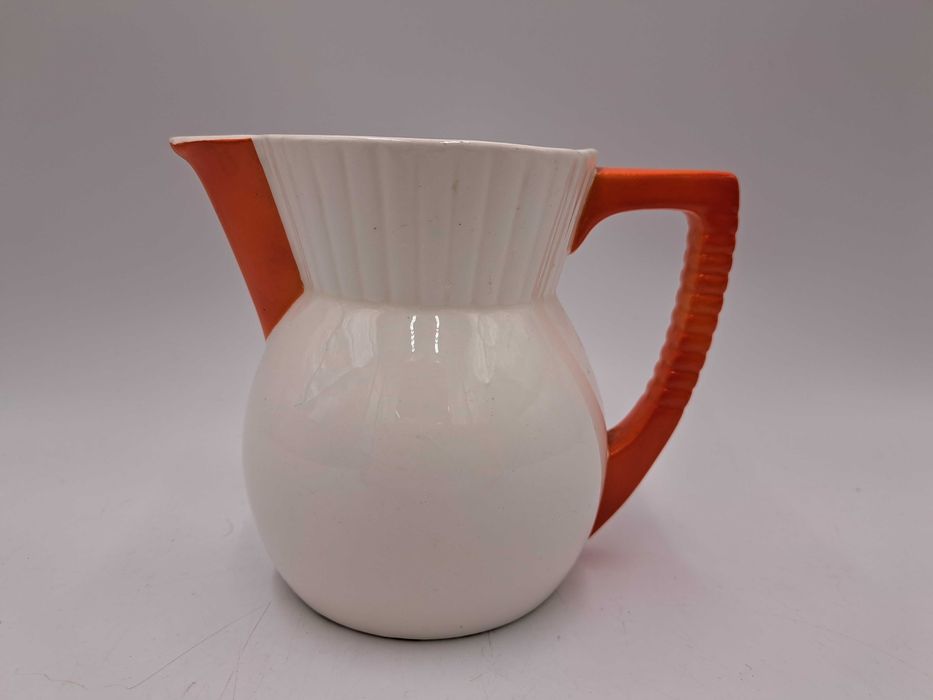 Stary dzbanek porcelana Max Roesler biały pomarańczowe ucho i dziubek