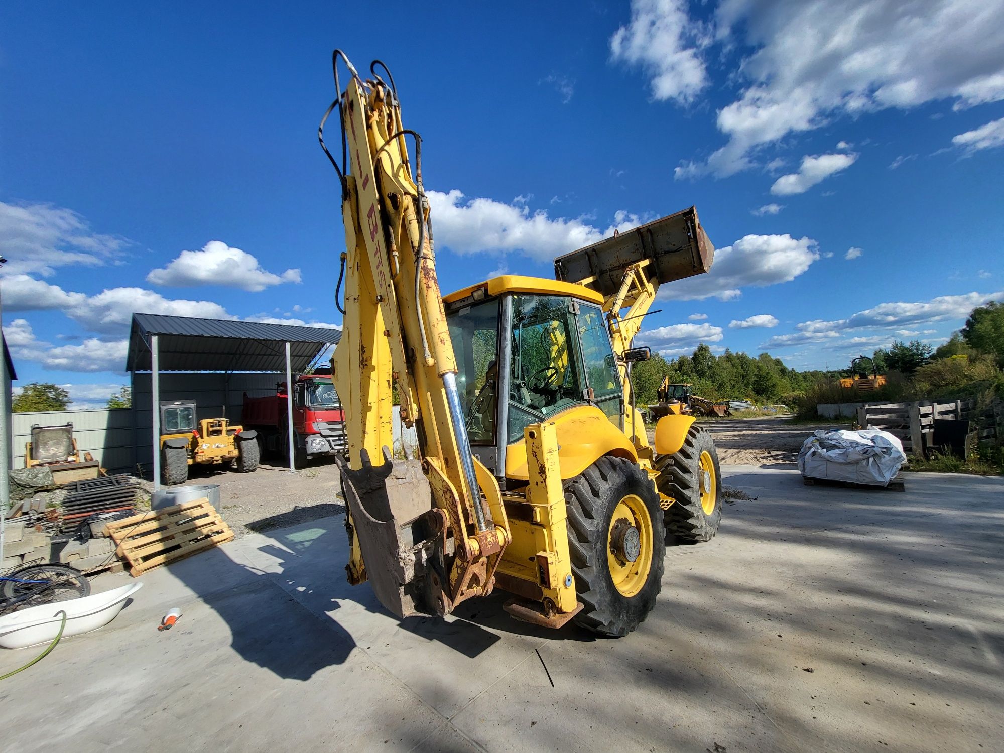 New holland lb 115 klima powershift koparko ładowarka