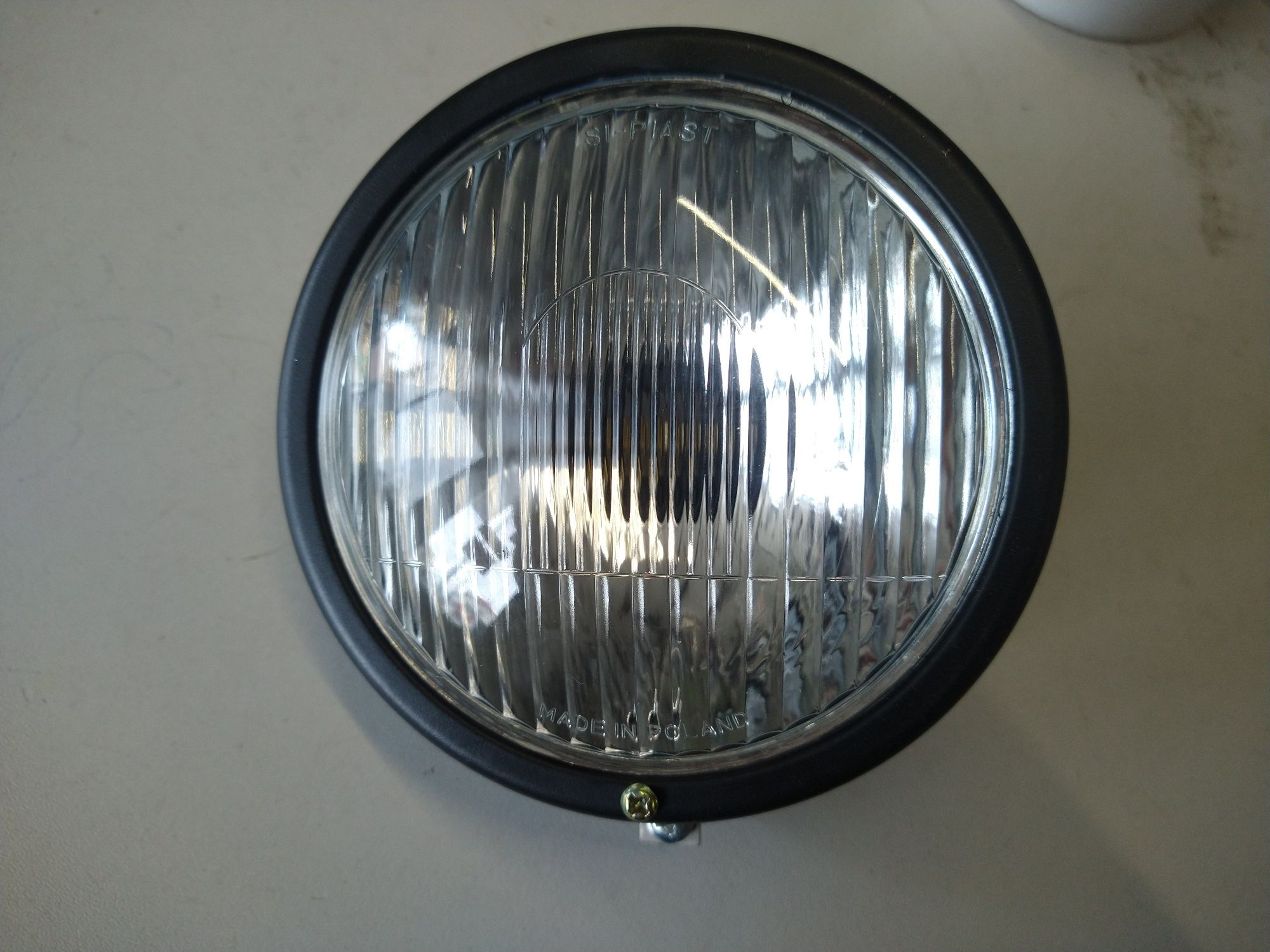 Komar Romet motorynka lampa przód szkło ramka element optyczny