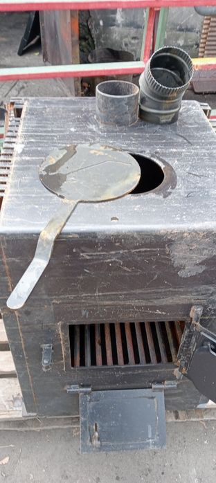 Печь- буржуйка фирмы ICARE с теплообменником.