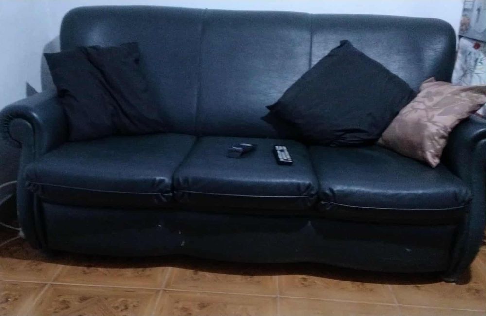 Sofá cama verde escuro