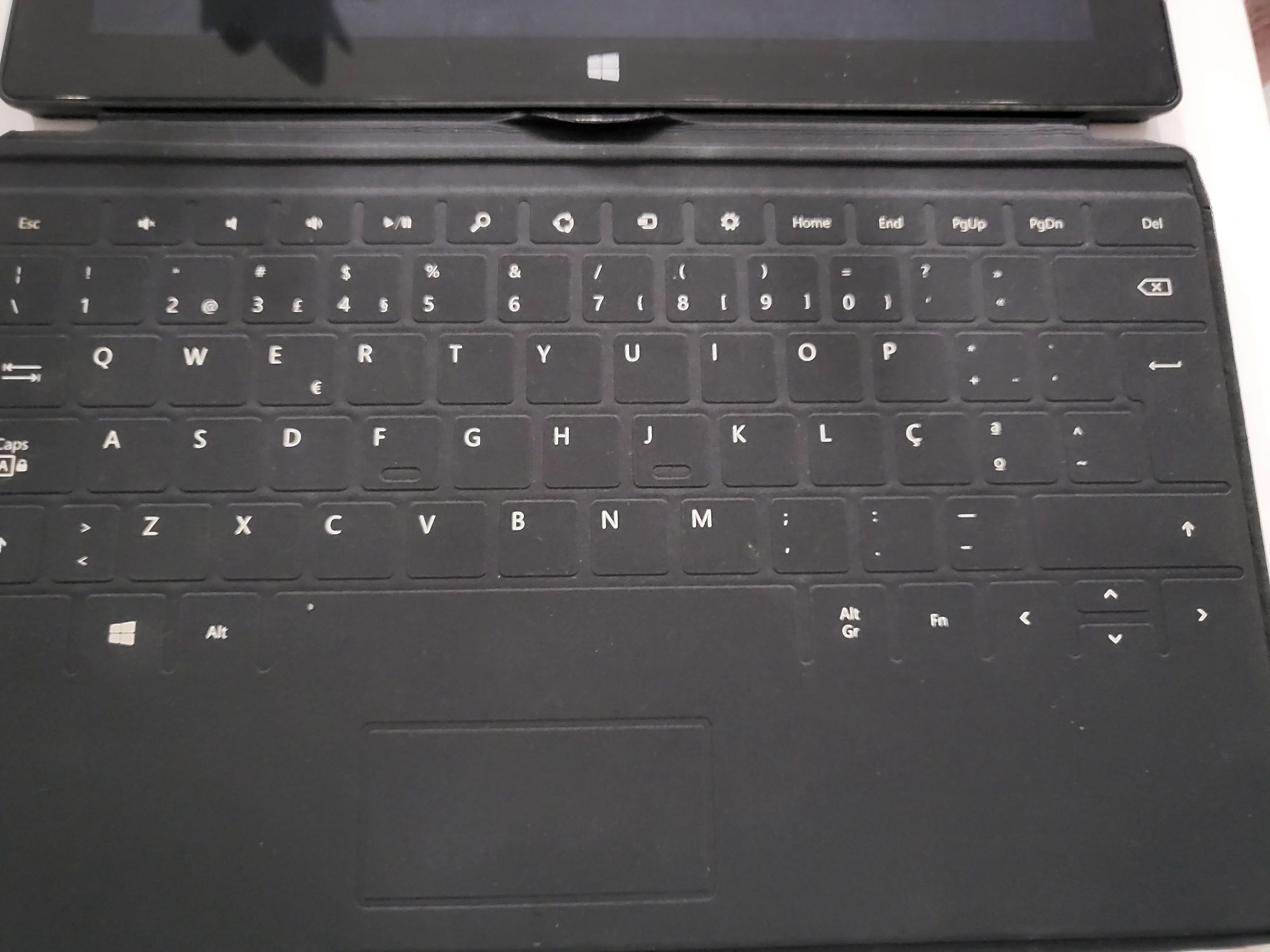 Surface cinza com capa teclado