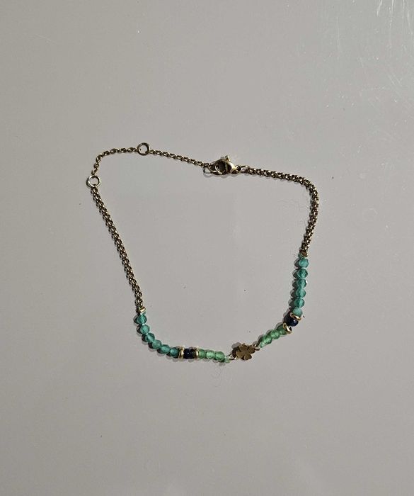 Pulseira em aço dourado