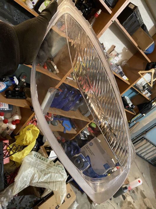 Скло на фари фабія 2