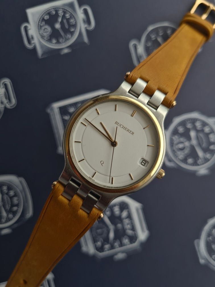 Bucherer zegarek szwajcarski swiss made kwarcowy stal zloto