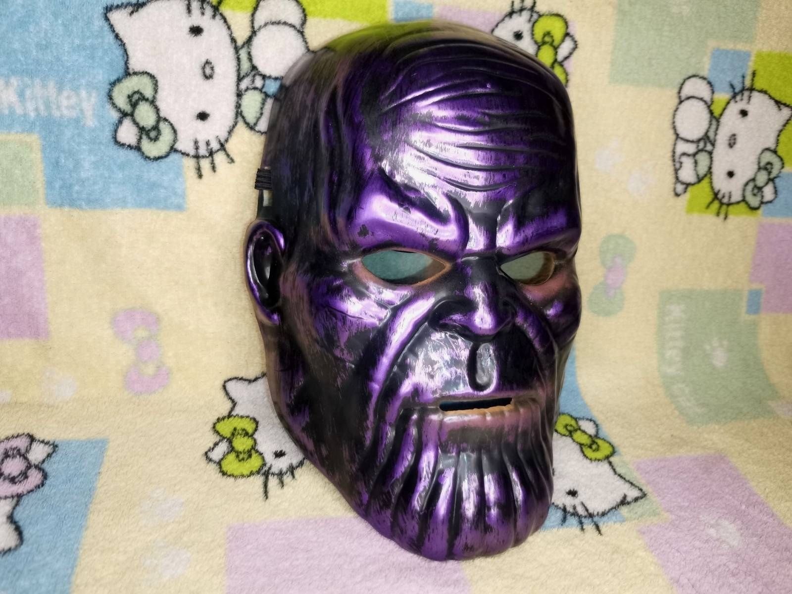 Танос Thanos злой персонаж вселенной комиксов Marvel Безумный титан