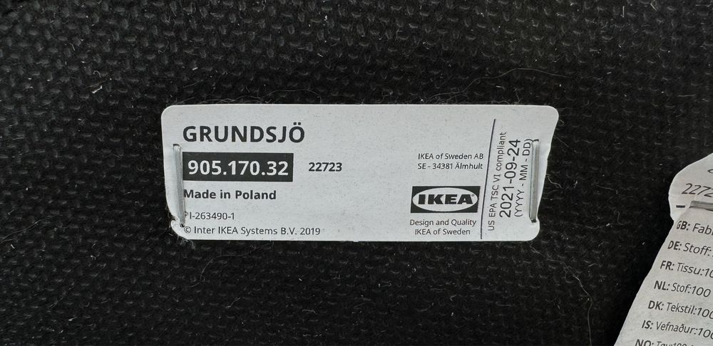 Ciemnoszary puf Gunnared GRUNDSJO IKEA 44x60 cm