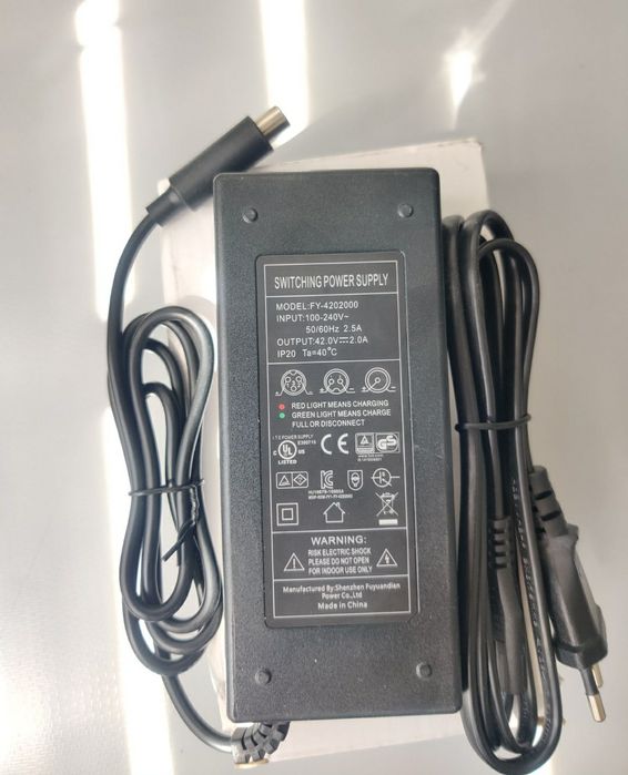 Зарядка для електро самоката - велосипеда