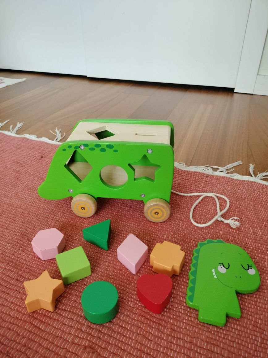 Carrinho dinossauro com peças puzzle de encaixe • brinquedo de madeir