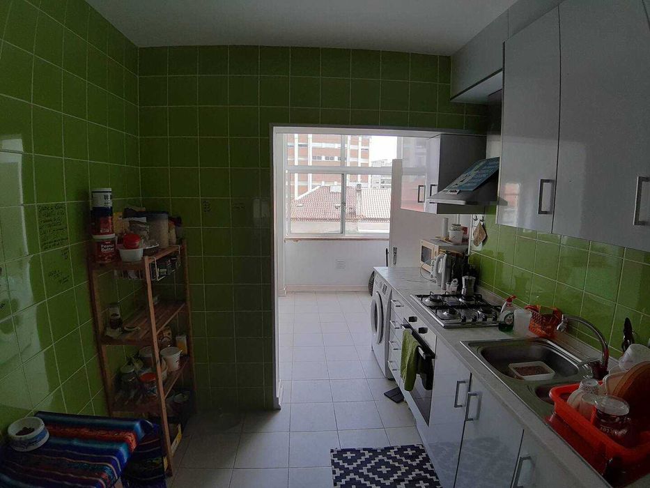 Quarto com varanda em Coimbra