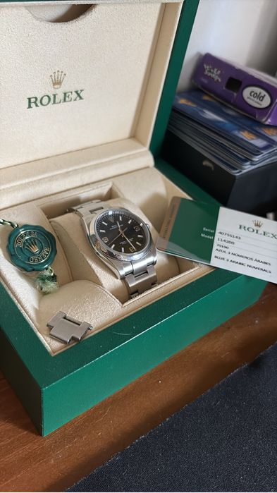 Rolex Oyster Perpetual 114200 blue dial arabic numerals 2016