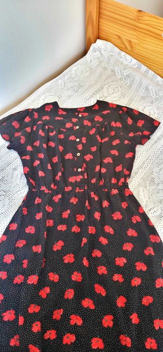 Vestido floral com manga flutuante