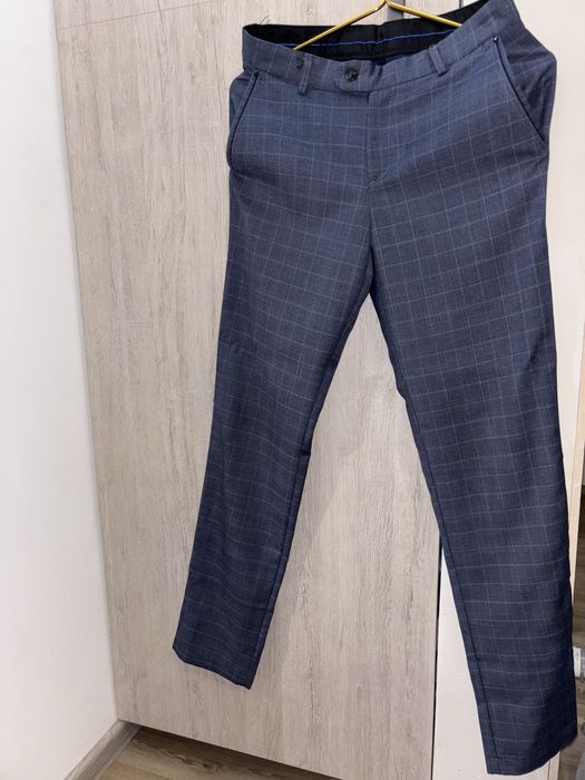 Підліткові брюки в клітинку синього кольору