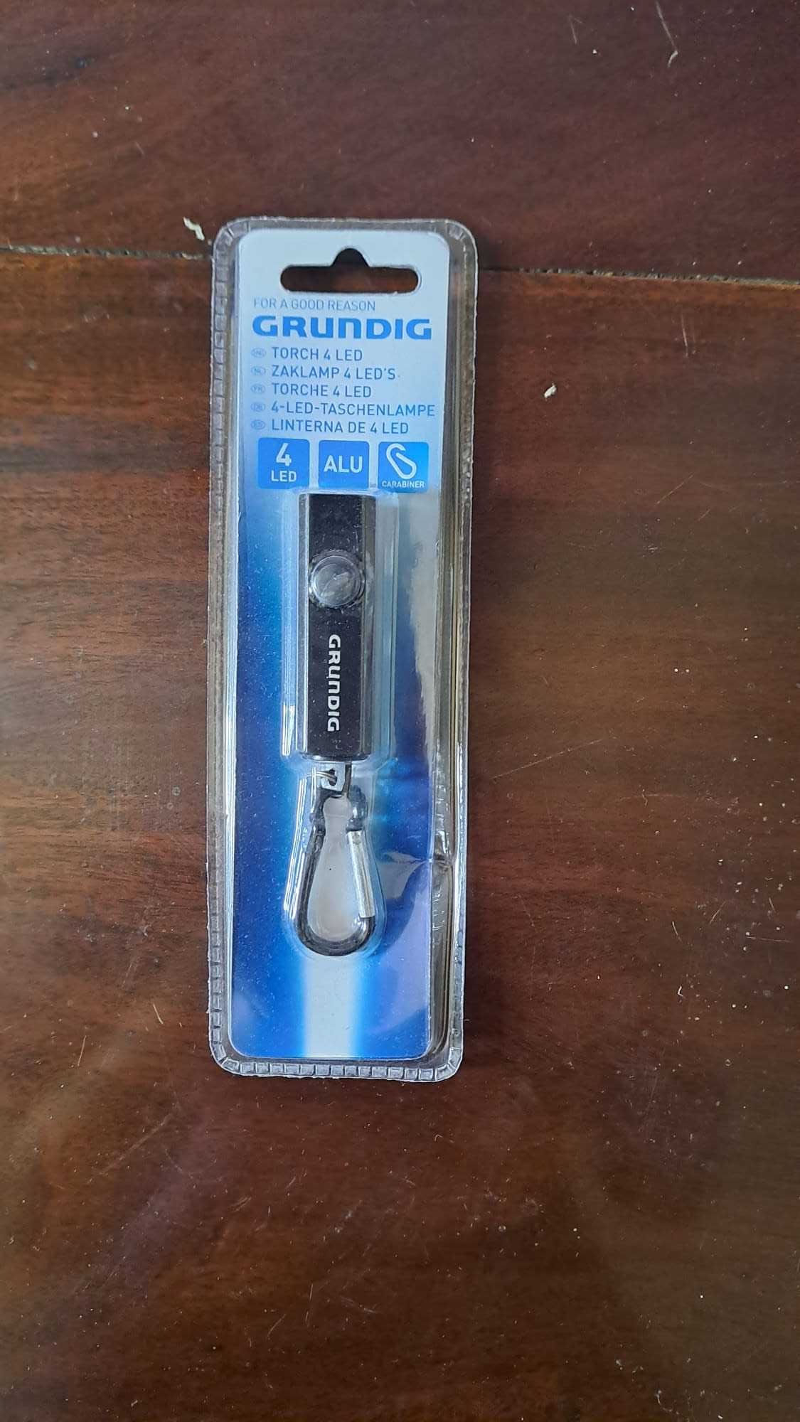 Laterna Grundig de bolso novo