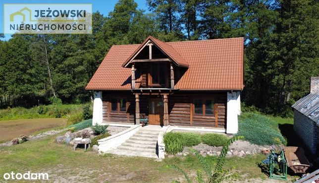 Drewniany dom nad rzeką Plewką, 6 km od Janowca.