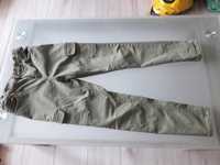 spodnie dżinsy jeansy z ubytkiem roz. 140