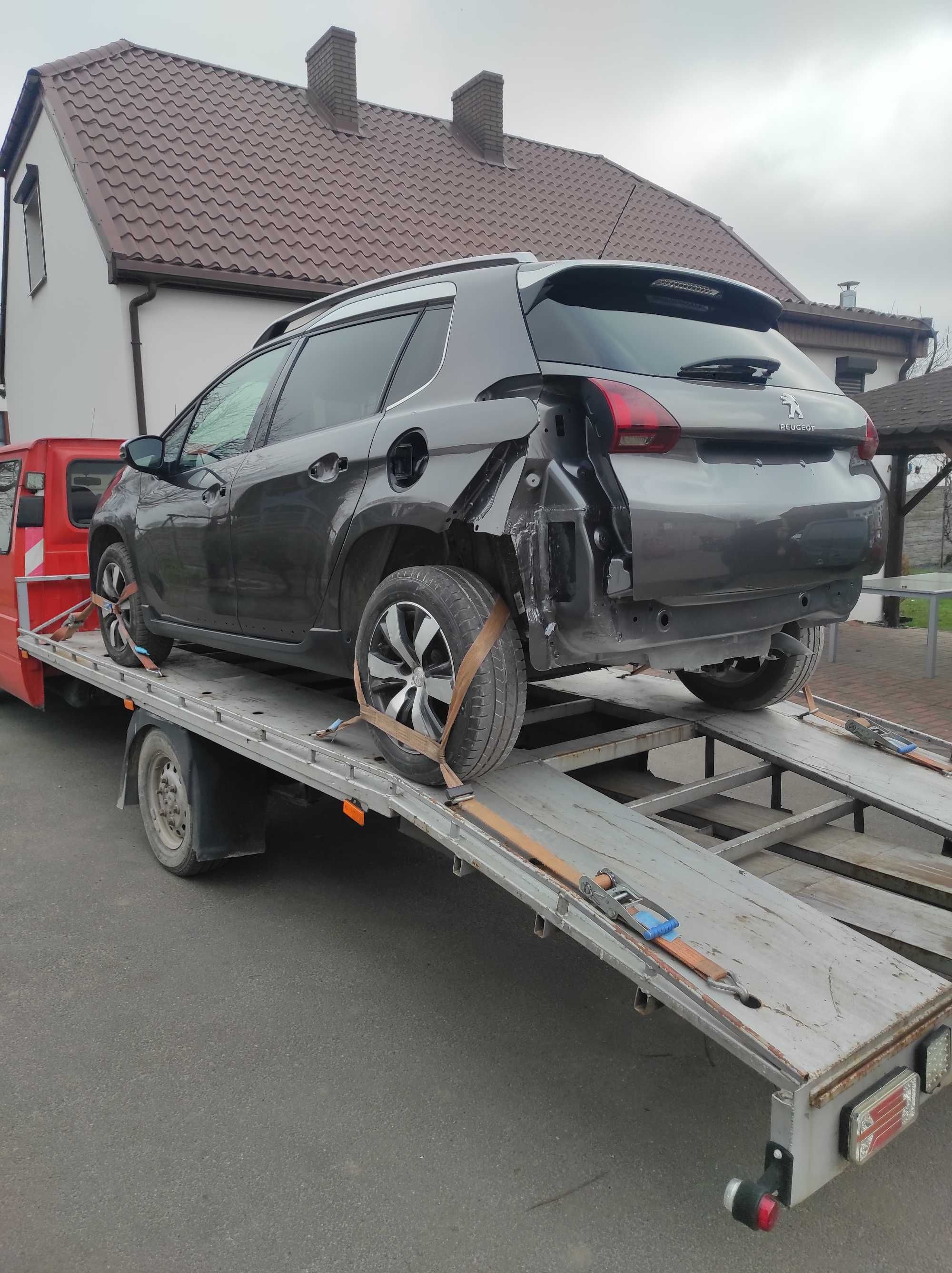 Pomoc drogowa autolaweta przewóz pojazdów holowanie