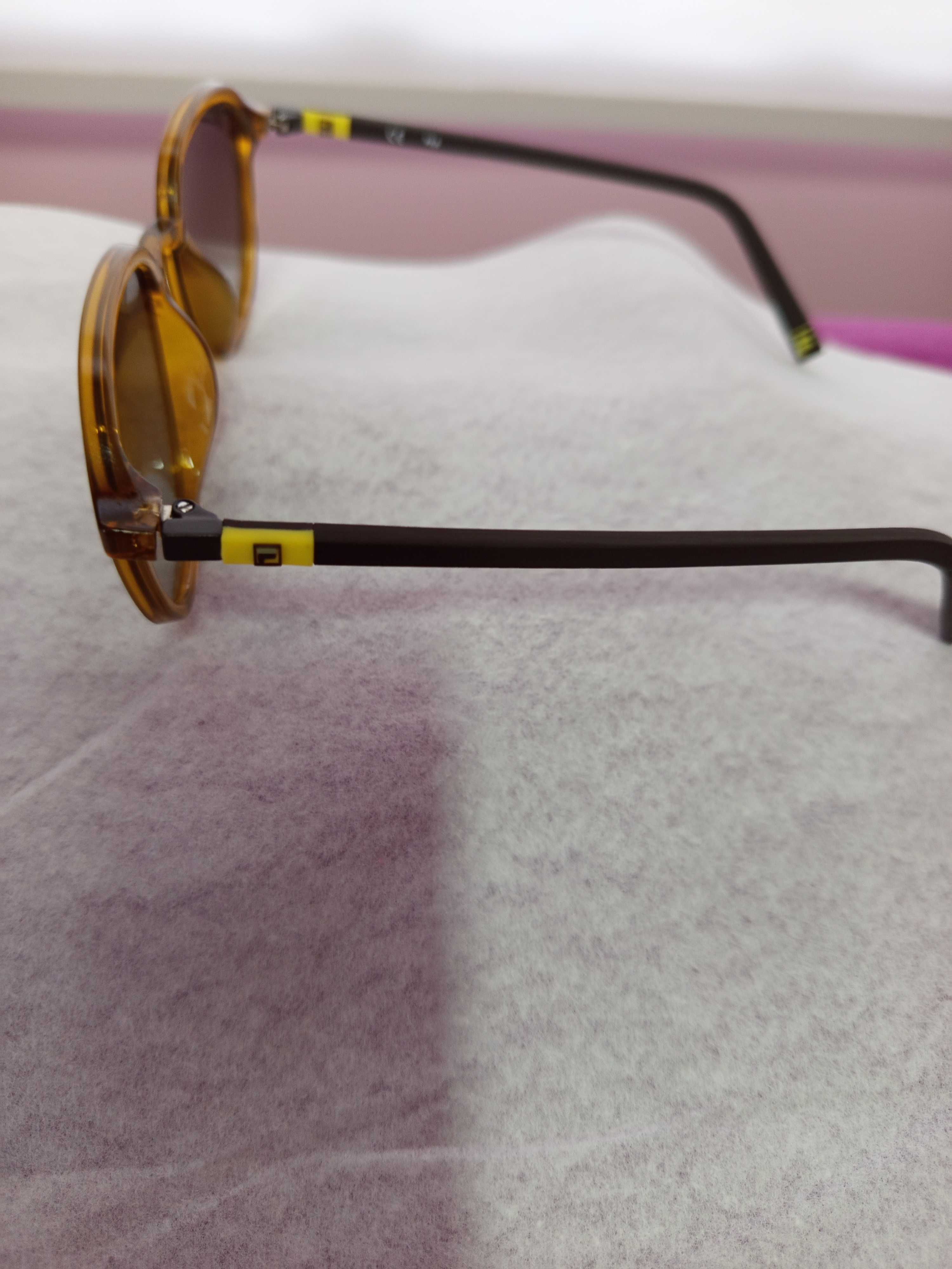 Excelentes muito bonitos oculos de sol da Fila com fatura