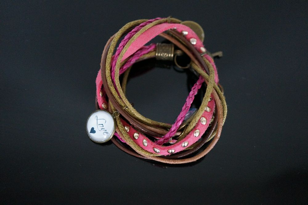 Bransoletka z rzemykami różowa rzemykowa na sznurku z zawieszkami