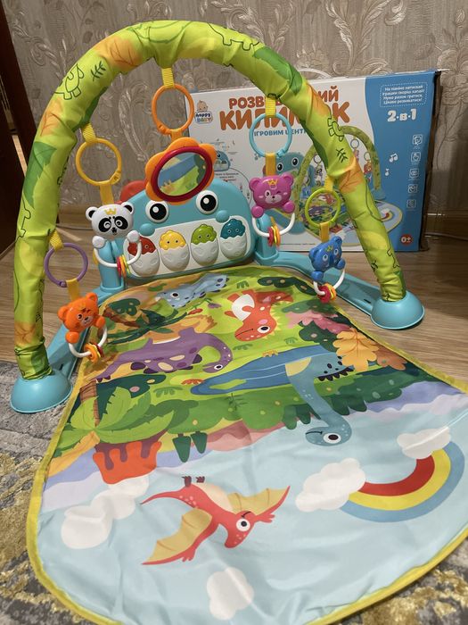 Розвиваючий килимок з ігровим центром