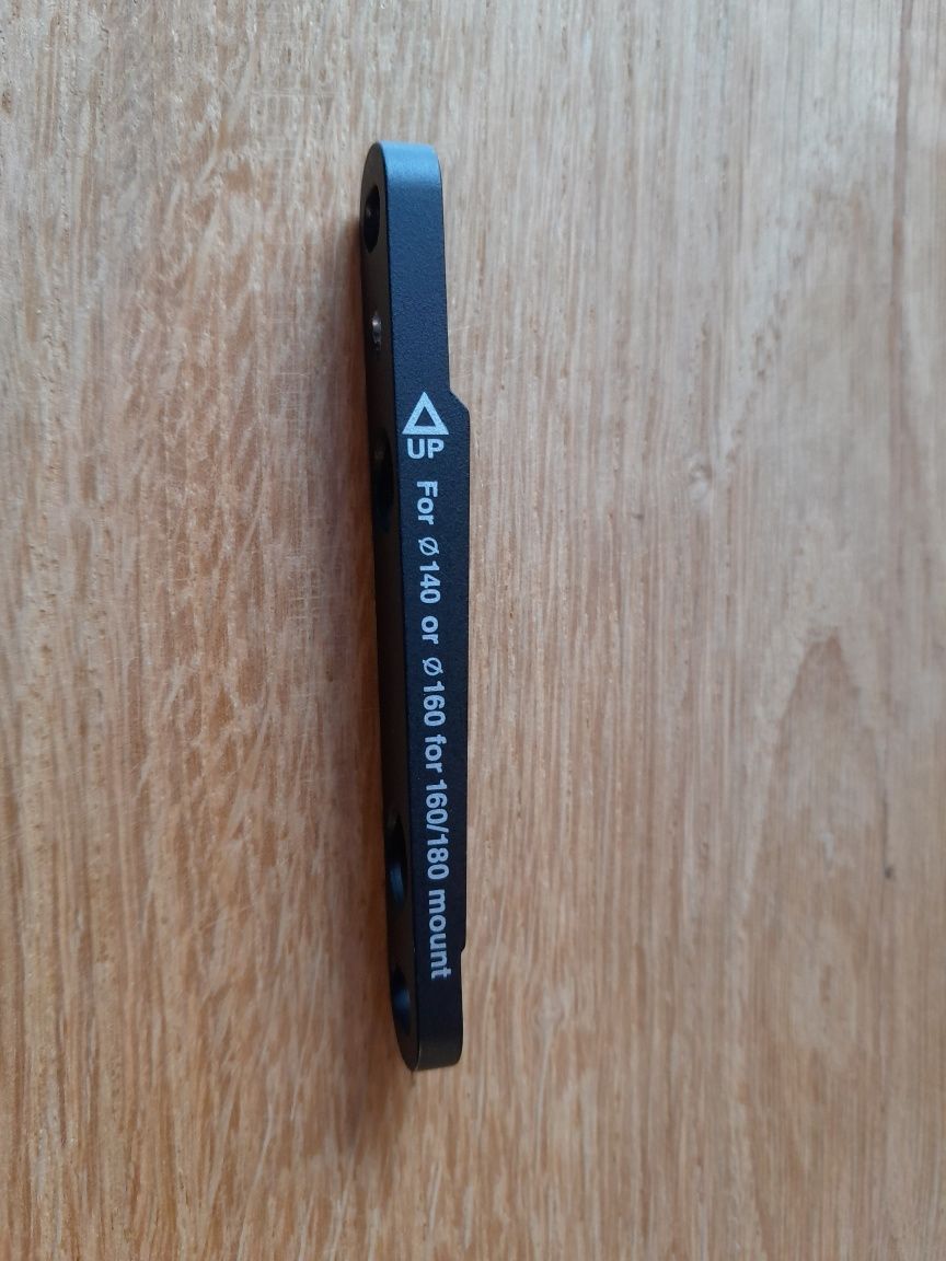 Adapter hamulca Shimano 140 160 Flat Mount Front