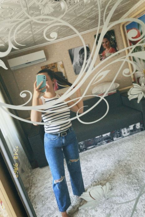 Жіночі джинси  з потертостями