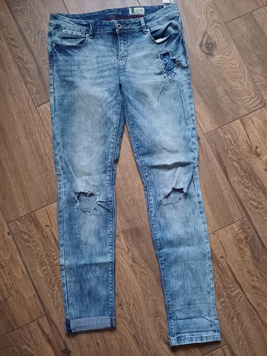 Dzinsy damskie z dziurami L/XL