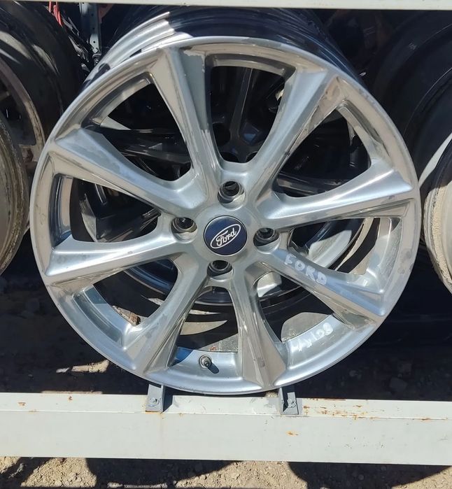 FORD FIESTA FELGI ALUMINIOWE 4X108 18&quot; E7,0JX18H2 ET47,5 DOT H1BC-1007-E1A KOMPLET