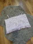 Blogerski crop top krótka bluzka na ramiączka z fredzlami