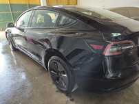 Tesla modelo 3 traição traseira