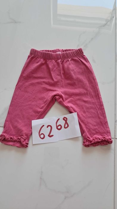 Spodnie niemowlęce materiałowe gładkie różowe falbanki St. Bernard