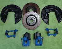 SWAP R36 VR6 VW Passat B6 B7 CC zaciski TRW jarzma tarcze 310mm tył