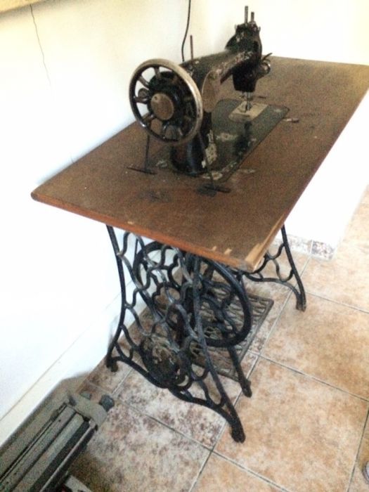 Maquina de costura singer a trabalhar antiga