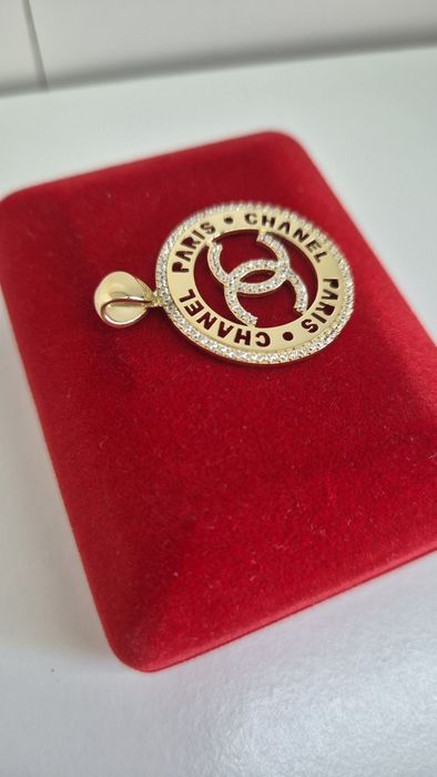 Złota zawieszka Channel,okrągła,białe cyrkonie,585