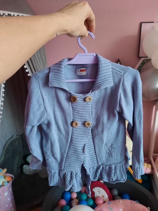 Sweterek dla dziewczynki z falbanką Name It