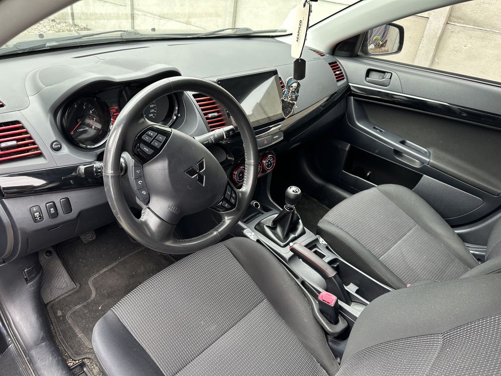 Mitsubishi Lancer 2012 oszczędny zrobiony na styl EVO przebieg 63771km