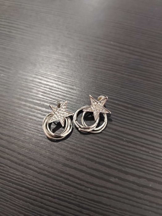 Brincos estrela na cor prata