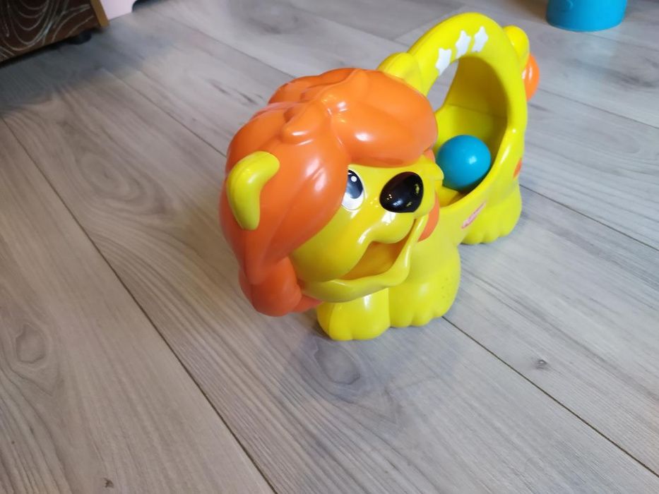 Zabawka interaktywna,kreatywna Playskool lew z piłeczkami,lew kuleczka