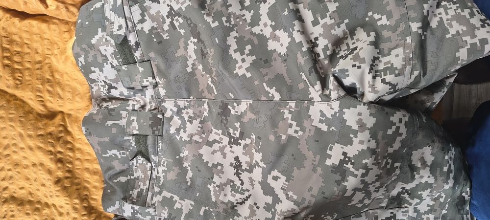 Продам штаны зимние ветрозащитные пиксель