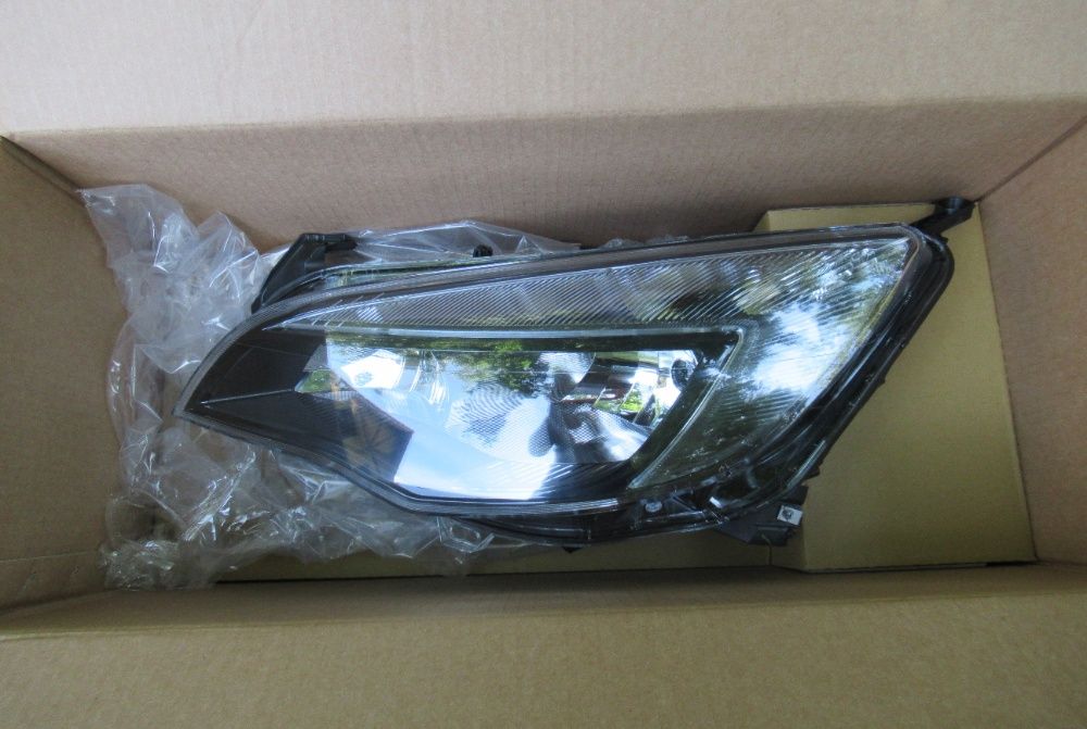 OPEL ASTRA IV LIFT 2013 - lampa przednia reflektor + led