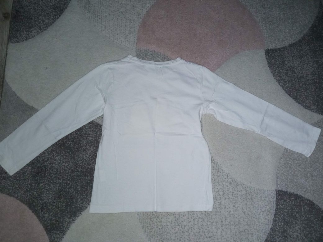 Biała bluzka z długim rękawem z Minionkami 122-128