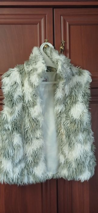 Теплі жилетки на дівчинку-підлітка