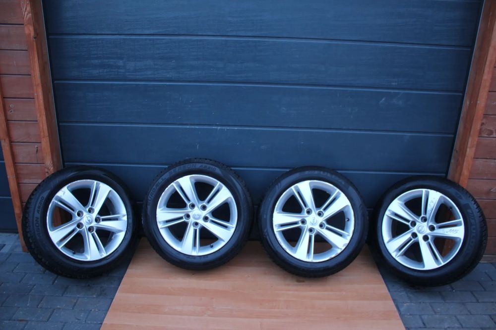 FELGI ALUMINIOWE KOŁA OPONY WIELOSEZON 2022r OPEL ASTRA J K ZAFIRA C INSIGNIA B R17 5x115 ET45 215/55/17
