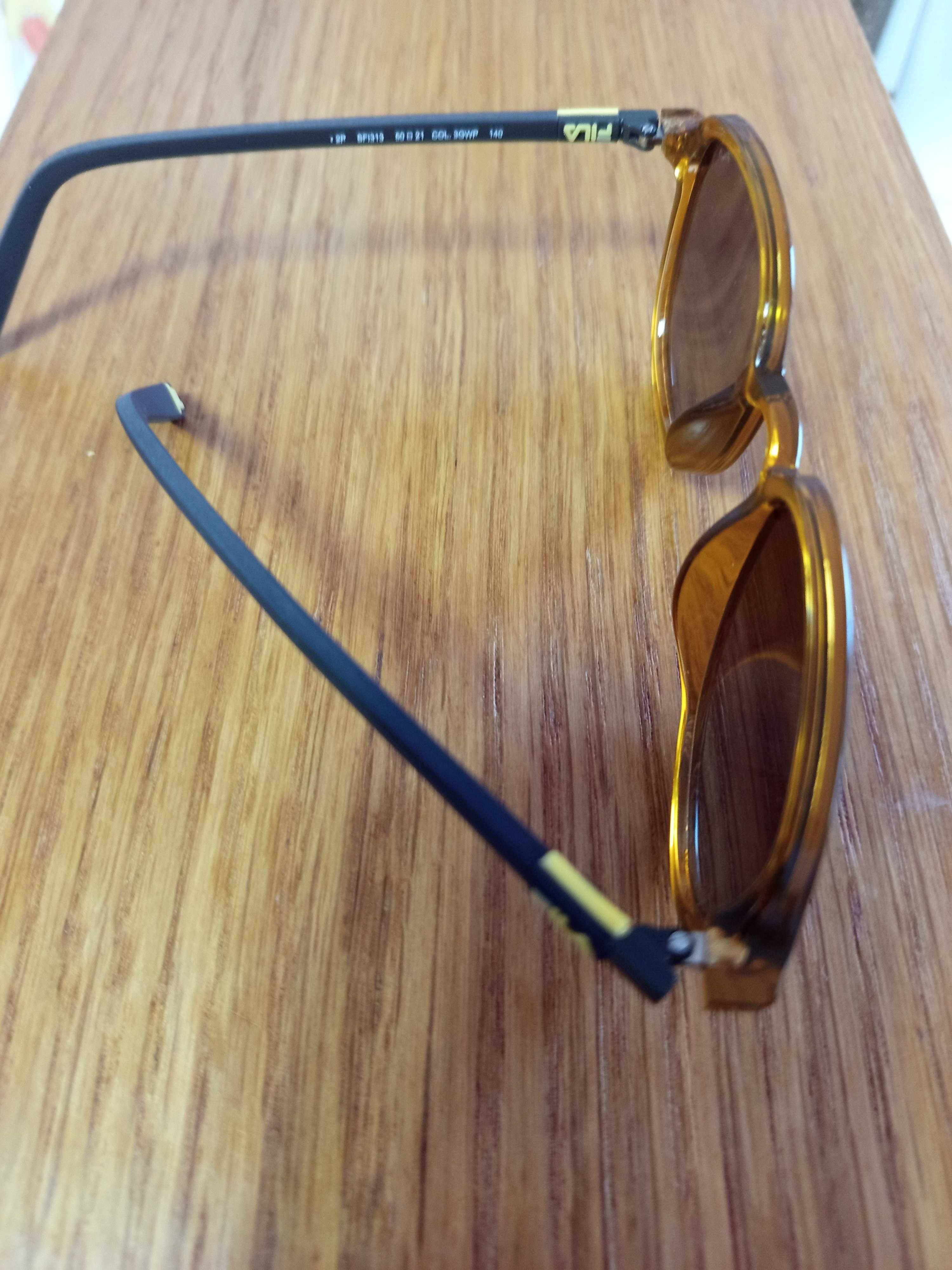 Excelentes muito bonitos oculos de sol da Fila com fatura